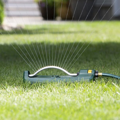 Melnor 65132AMZ Turbo Oscillating Sprinkler with Watering Gauge, Covers Up to 3,600 Sq. Ft., 18 Brass Nozzles, Adjustable Watering Range, Quick Connect Bundle, Green, Yellow