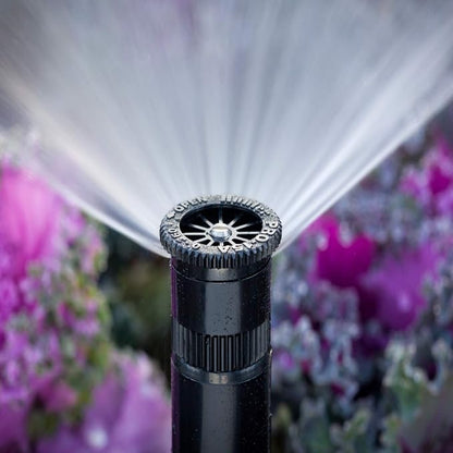 Hunter 15A Adjustable Lawn Sprinkler Nozzle, 15 ft Radius, 0°-360° Arc | 15 ft adjustable spray nozzle for pop-up sprinkler bodies with 0°-360° arc, gray top, filter screen, and hand adjustment