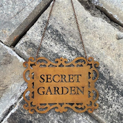 Rustic Iron “Secret Garden” Hanging Sign, Natural Rust Patina Metal Plaque with Ornate Cutout Scrollwork and Chain, Garden Gate & Wall Decor, 7.9 × 5.9 Inches