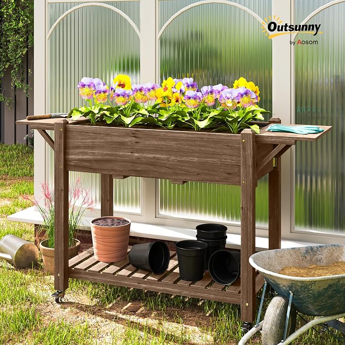 Outsunny Raised Garden Bed, 57 x 20.5 x 34 in Wood Elevated Planter Box with Lockable Wheels, Side Tables and Bottom Shelf, Outdoor Raised Planter with Bed Liner and Drainage Holes, Carbonized