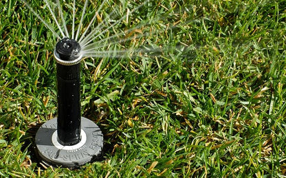 Hunter PRS40 4 in. Pop-Up Sprinkler Head Body, 40 PSI Regulator, No Nozzle | 40 PSI pressure-regulated lawn sprinkler body with 1/2 in. inlet, gray cap, and heavy spring for female-thread nozzles